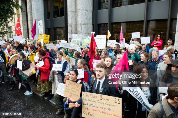 Extinction Rebellion environmental activists protests outside the offices of The Department of Working Pensions during a gathering where they...