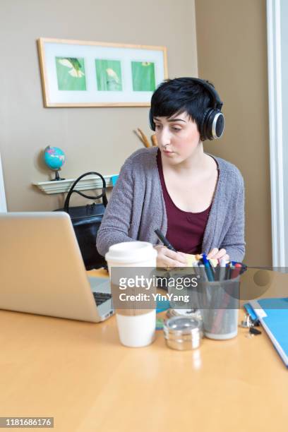 millennial young woman working in home office telecommuting - transcrição imagens e fotografias de stock