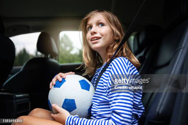 girl going to soccer practice - drive ball sports stock pictures, royalty-free photos & images