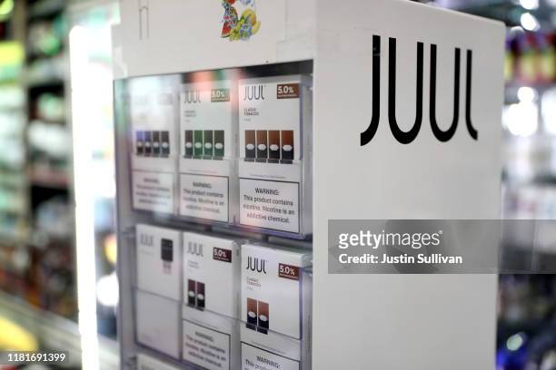 Juul products are displayed at Smoke and Gift Shop on October 17, 2019 in San Francisco, California. Juul announced plans to immediately suspend...