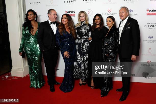 Guest, Nick Ede, Maria Bravo, Melanie Griffiths, Nilam Holmes, Eva Longoria Baston and Harold Tillman attend the annual Global Gift Gala London at...