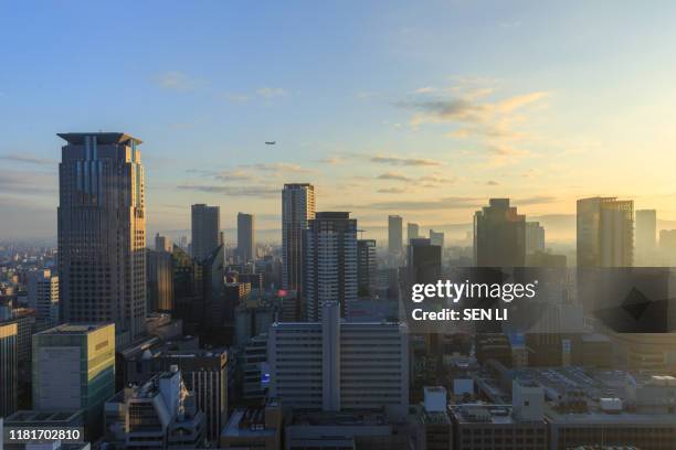sunrise in osaka, skyline of umeda district - japan skyline stock pictures, royalty-free photos & images