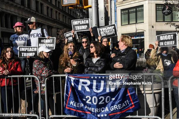 Anti-Trump and Pro-Trump people participate in a protest ahead of U.S. President Donald Trump speaking at the opening ceremony of the New York City...