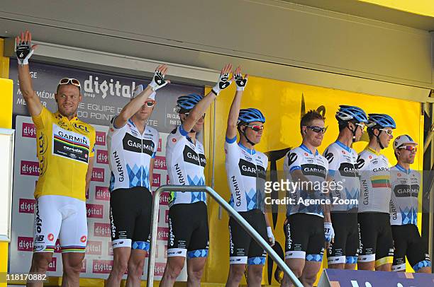 Team Garmin - Cervelo stands on the podium during Stage Three of the 2011 Tour de France from Olonne-sur-Mer to Redon on July 4, 2011 in...