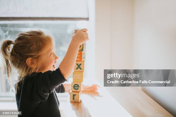 building blocks - child and blocks stock pictures, royalty-free photos & images