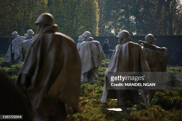 Visitors to the Korean War Memorial are seen on November 11, 2019 on Veterans Day in Washington DC.
