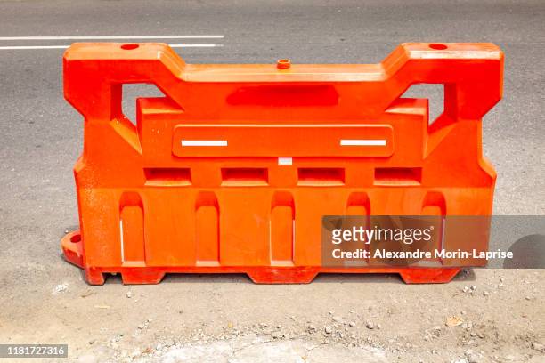 barricade of construction in street of circulation of vehicles - barricade stock pictures, royalty-free photos & images