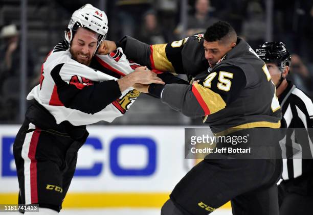 Ryan Reaves of the Vegas Golden Knights fights Scott Sabourin of the Ottawa Senators during the first period at T-Mobile Arena on October 17, 2019 in...