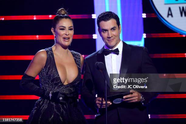Ninel Conde and David Zepeda speak onstage during the 2019 Latin American Music Awards at Dolby Theatre on October 17, 2019 in Hollywood, California.