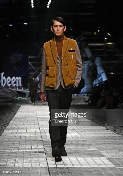 Model showcases designs on runway of Cabbeen collection show on day nine of Shanghai Fashion Week Spring/Summer 2020 on October 17, 2019 in Shanghai,...