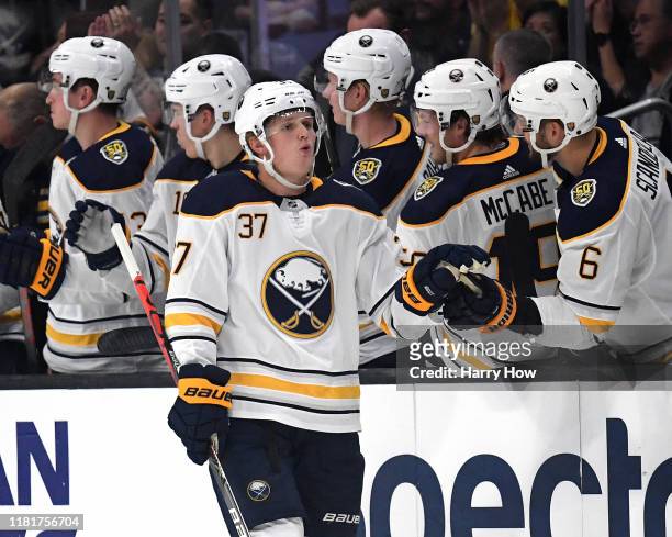 Casey Mittelstadt of the Buffalo Sabres celebrates his goal with the bench, to take a 3-0 lead over the Los Angeles Kings, during the second period...