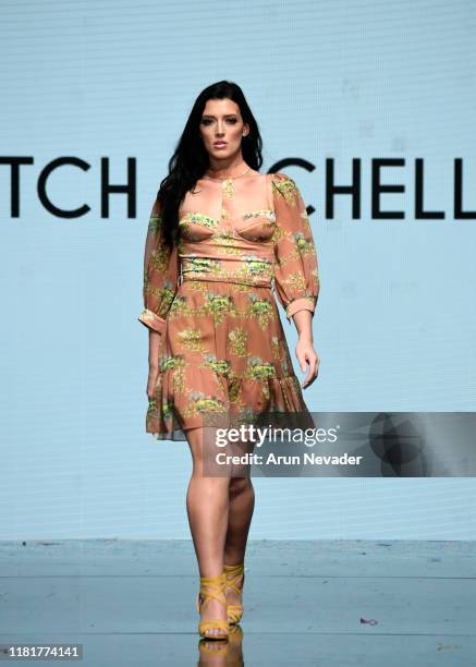 Shannon Elizabeth walks the runway wearing Catch Michelle during Los Angeles Fashion Week SS/20 Powered by Art Hearts Fashion on October 17, 2019 in...