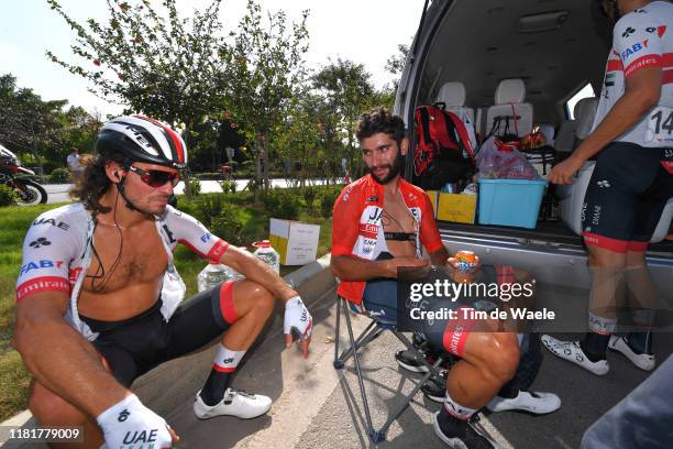 Arrival / Roberto Ferrari of Italy and UAE - Team Emirates / Fernando Gaviria of Colombia and UAE - Team Emirates Red Leader Jersey / Refreshment /...