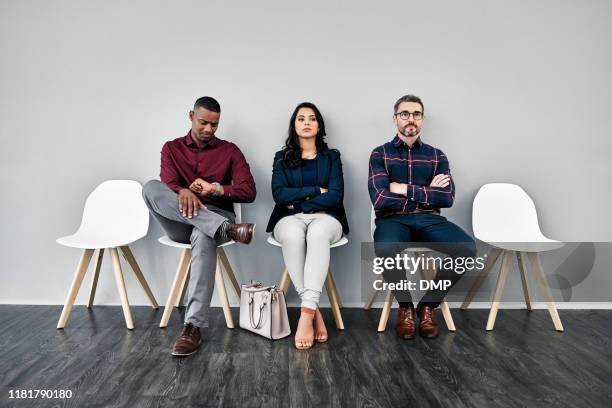 it won't be long now - woman waiting in line stock pictures, royalty-free photos & images