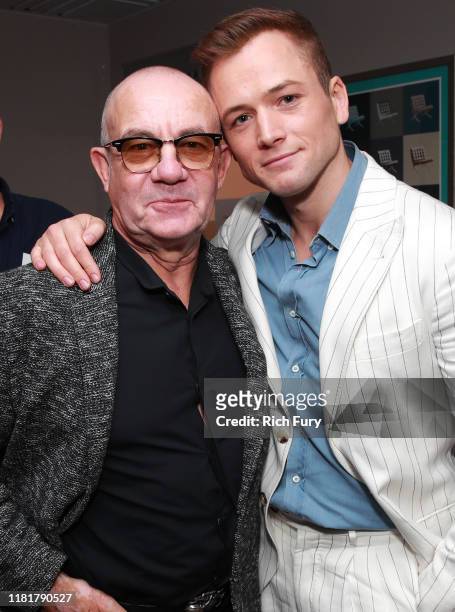 Bernie Taupin and Taron Egerton attend Rocketman: Live in Concert at the Greek Theatre in Los Angeles on October 17, 2019.