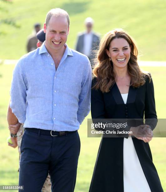 Prince William, Duke of Cambridge and Catherine, Duchess of Cambridge smiles as they visit an Army Canine Centre, where the UK provides support to a...