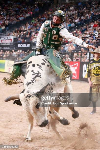 Cooper Davis rides bull Trail of Tears during the Championship round of the Professional Bull Riders World Finals, on November 10 at T-Mobile Arena,...