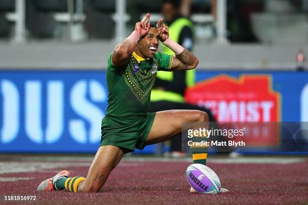 Josh Addo-Carr of Australia celebrates scoring a try during the round one Rugby League World Cup 9s match between Australia and New Zealand at...