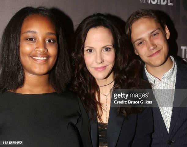 Caroline Aberash Parker, mother Mary-Louise Parker and son William Atticus Parker pose at the opening night of the new play "The Sound Inside" on...