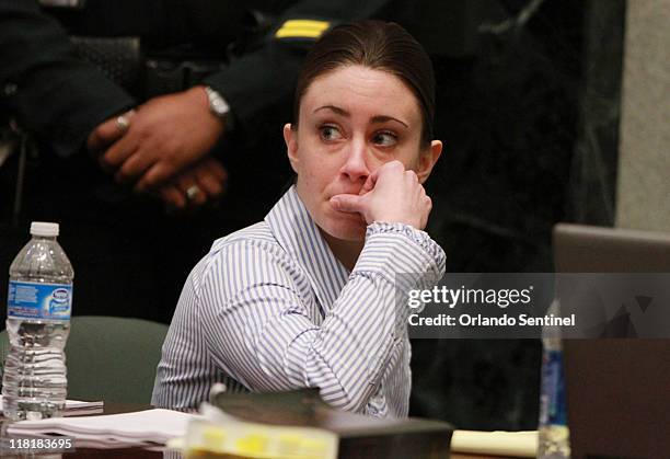 Casey Anthony sits at the defense table after the jury left to begin deliberations in her murder trial at the Orange County Courthouse in Orlando,...