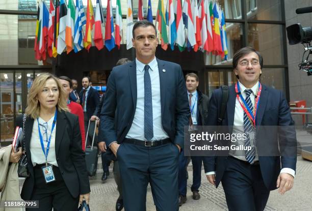 Spanish Prime Minister Pedro Sanchez emerges from a meeting of the European Council at the conclusion of a two-day summit of European Union leaders...