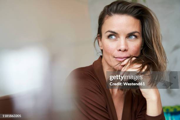 portrait of attractive brunette woman - beautiful older women imagens e fotografias de stock