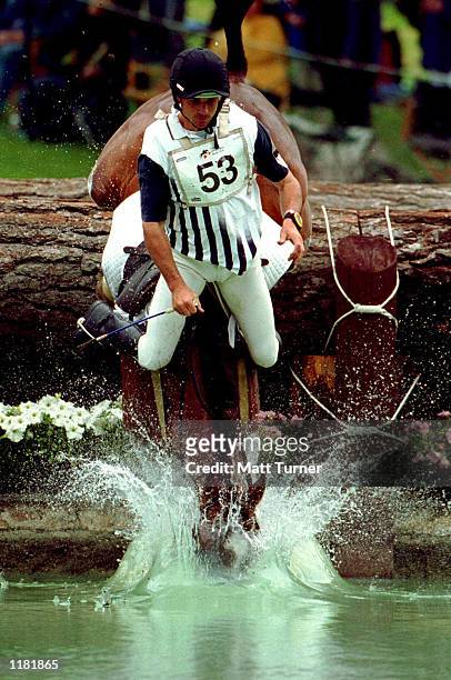 Australian three star rider Ross Spalding falls from his mount ''Trilogy'' at the water jump in the cross country section of The International Horse...