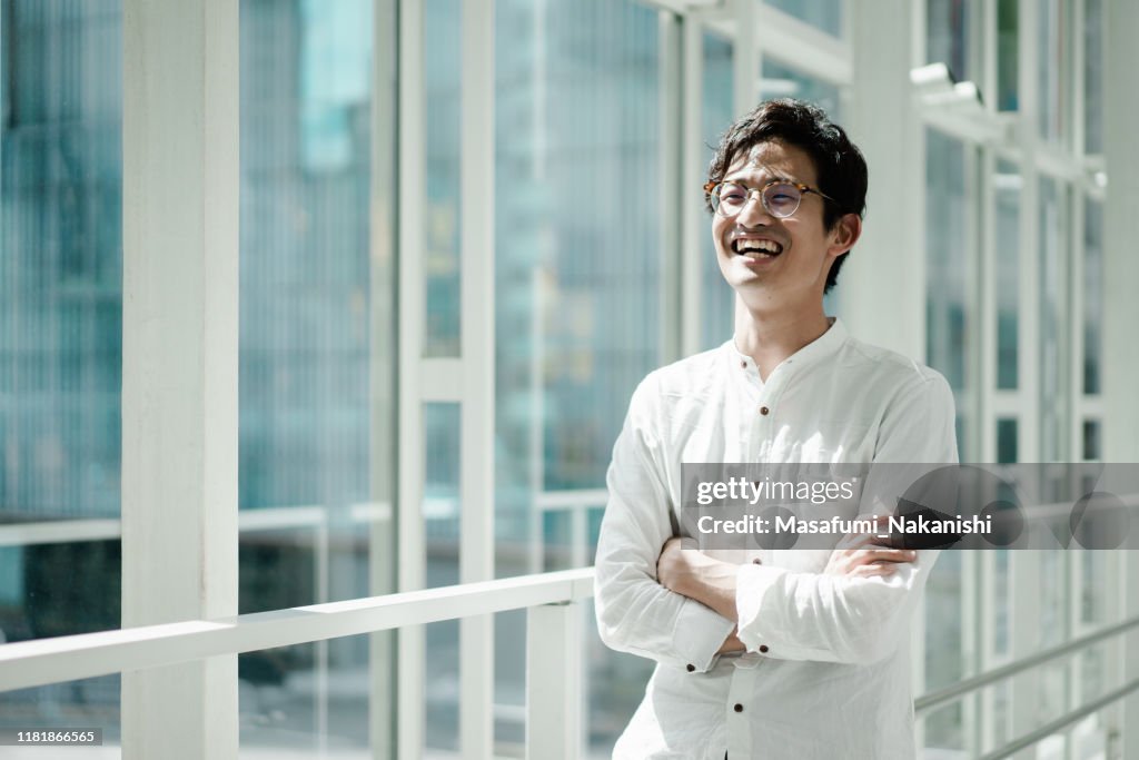 Casual portrait of a young Asian business person