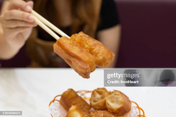 deep-fried dough stick - fried dough stock pictures, royalty-free photos & images