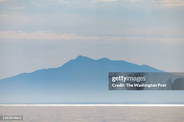 Russian's Kunashir Island is seen from the town of Rausu on Sunday, September 29 in Hokkaido, Japan.