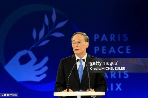 China's Vice President Wang Qishan delivers a speech during the plenary session of the Paris Peace Forum, on November 12, 2019 in Paris.