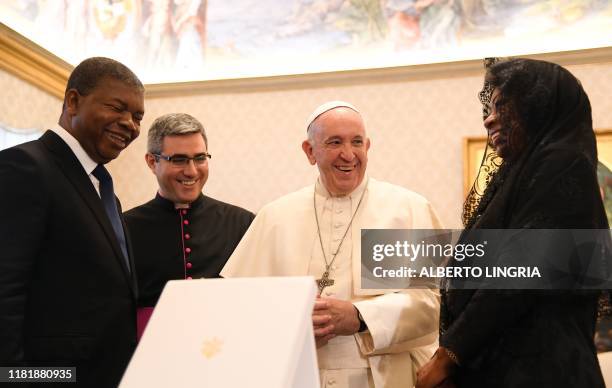 Pope Francis , Angola's President Joao Lourenco and his wife Ana Dias Lourenco exchange gifts within a private audience on November 12, 2019 at the...