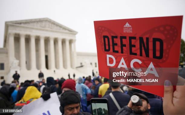 Immigration rights activists take part in a rally in front of the US Supreme Court in Washington, DC on November 12, 2019. - The US Supreme Court...