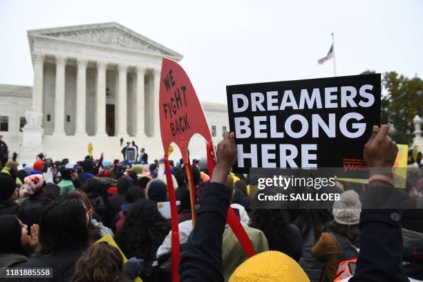 Immigration rights activists take part in a rally in front of the US Supreme Court in Washington, DC on November 12, 2019. - The US Supreme Court...