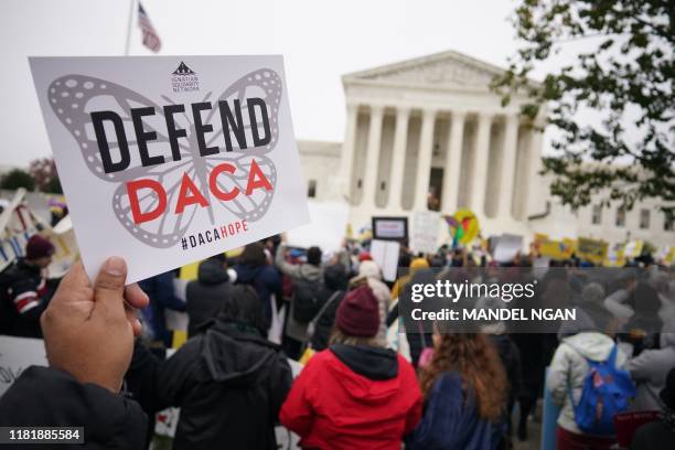 Immigration rights activists take part in a rally in front of the US Supreme Court in Washington, DC on November 12, 2019. - The US Supreme Court...