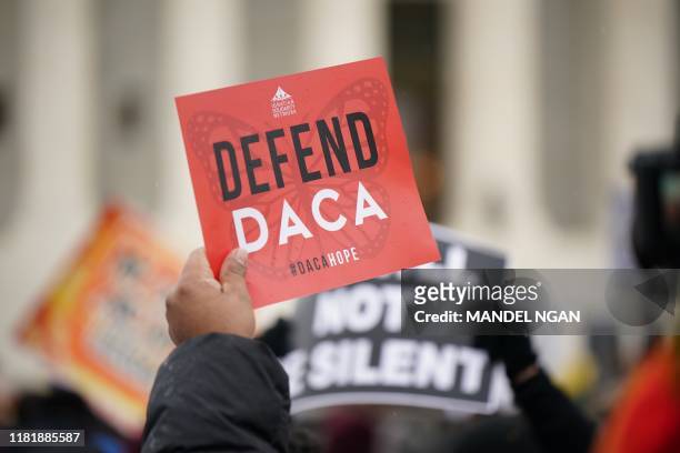 Immigration rights activists take part in a rally in front of the US Supreme Court in Washington, DC on November 12, 2019. - The US Supreme Court...