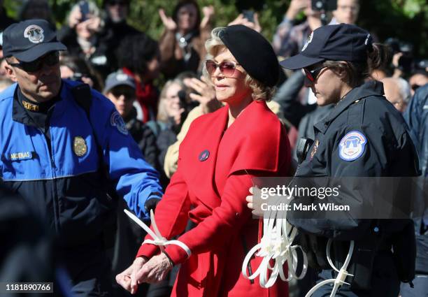 Actress Jane Fonda is arrested for blocking a street in front of the U.S. Capitol during a “Fire Drill Fridays” climate change protest and rally on...