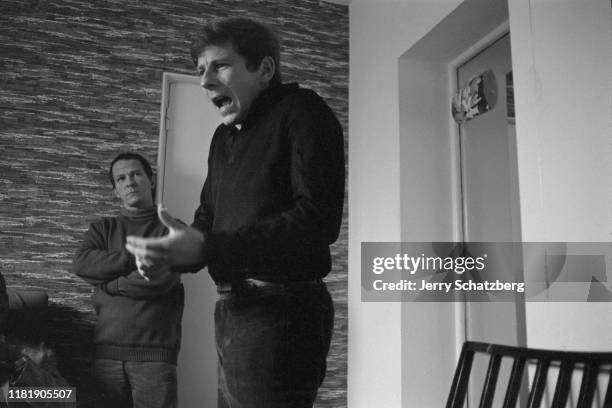 French-born Polish film director Roman Polanski gestures emphatically on the set of his film 'Repulsion,' as French screenwriter Gerard Brach...