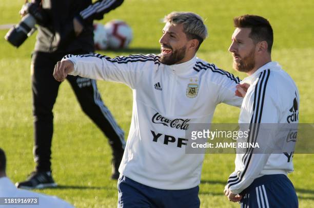 Argentina´s forwards Sergio Aguero and Lionel Messi attend a training session at Ciudad Deportiva Antonio Asensio in Palma de Mallorca on November...