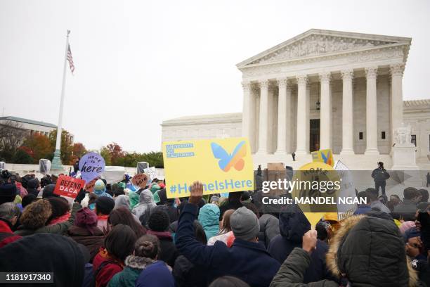 Immigration rights activists take part in a rally in front of the US Supreme Court in Washington, DC on November 12, 2019. - The US Supreme Court...