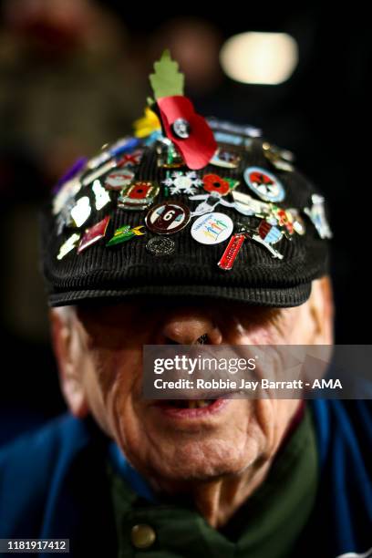 Fan of West Ham United wearing a flat cap covered in pin badges during the Premier League match between Burnley FC and West Ham United at Turf Moor...