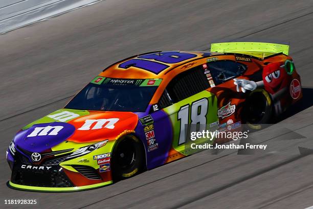Kyle Busch, driver of the M&M's Halloween Toyota, practices for the Monster Energy NASCAR Cup Series Hollywood Casino 400 at Kansas Speedway on...