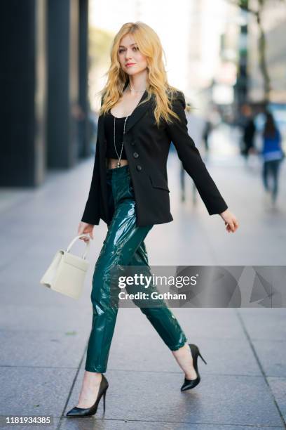 Katherine McNamara is seen wearing Zeynep Arcay top and pants with Dorothee Schumacher blazer, Sam Edelman shoes and a Mounser necklace in the...