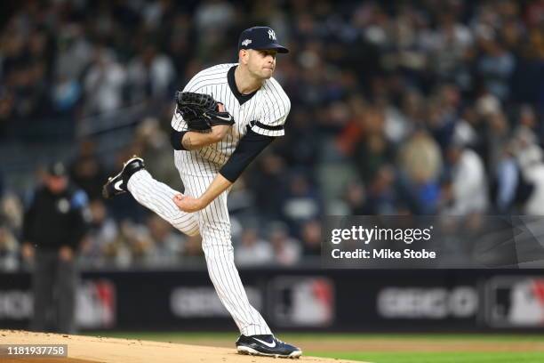 James Paxton of the New York Yankees throws a pitch against the Houston Astros during the first inning in game five of the American League...