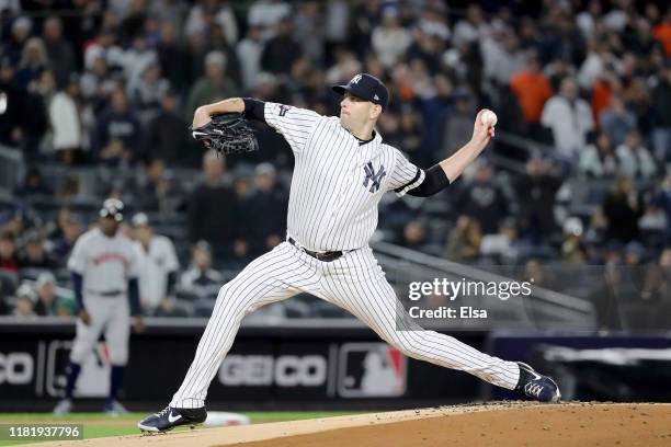 James Paxton of the New York Yankees throws a pitch against the Houston Astros during the first inning in game five of the American League...