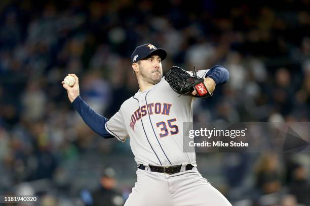 Justin Verlander of the Houston Astros throws a pitch against the New York Yankees during the first inning in game five of the American League...