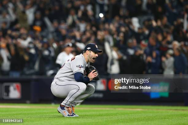 Justin Verlander of the Houston Astros reacts after giving up a three run home run to Aaron Hicks of the New York Yankees during the first inning in...