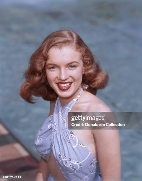 Actress Marilyn Monroe then known as Norma Jeane Mortenson poses for a portrait in 1946 in Los Angeles, California.