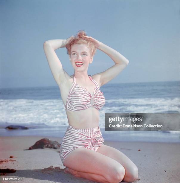 Actress Marilyn Monroe then known as Norma Jeane Mortenson poses for a portrait in 1946 in Los Angeles, California.