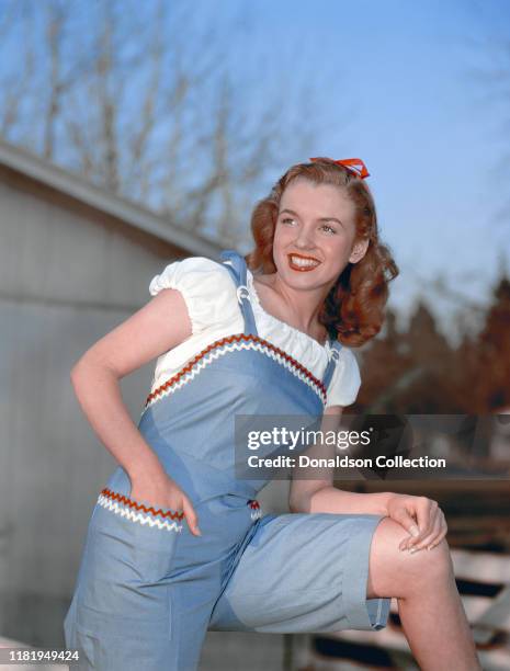 Actress Marilyn Monroe then known as Norma Jeane Mortenson poses for a portrait in 1946 in Los Angeles, California.